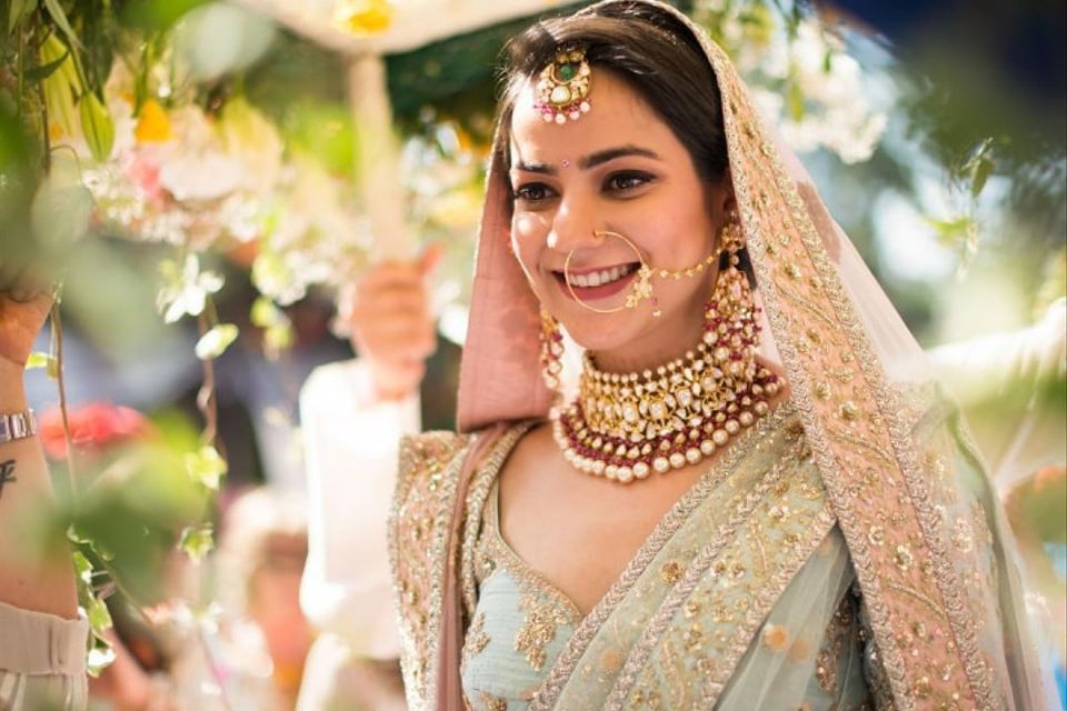 Photo of Red bridal lehenga with beautiful bridal makeup