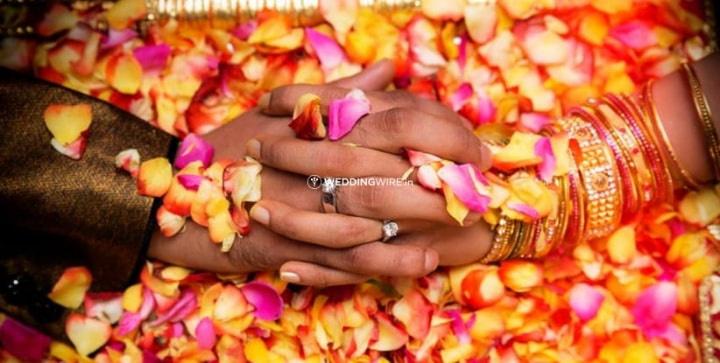 Two wedding rings on abstract background, close-up Stock Photo - Alamy