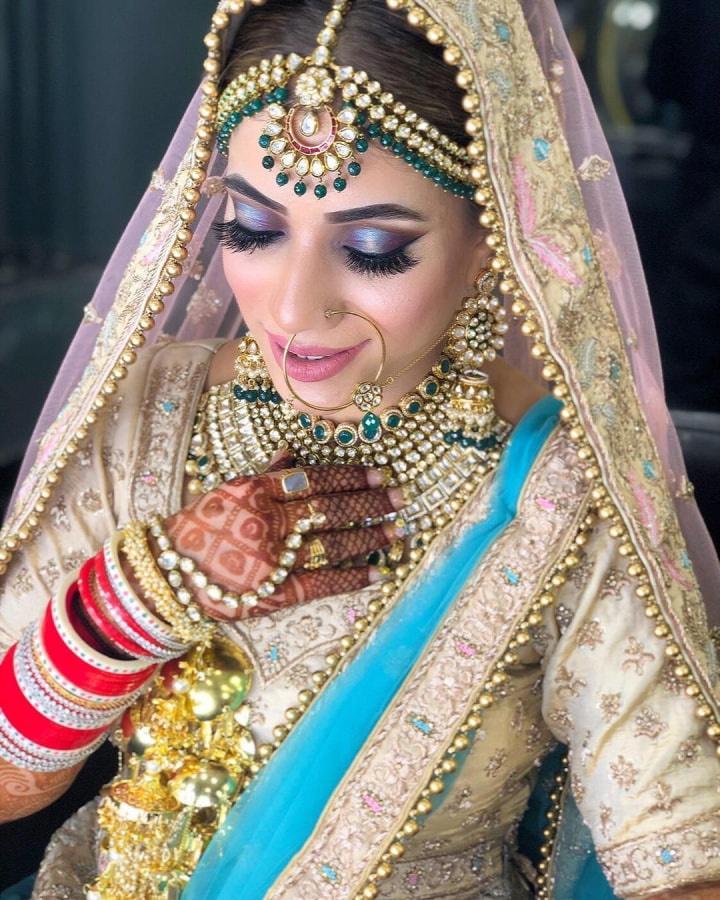 Photo of Winter bridal makeup with maroon smokey eye