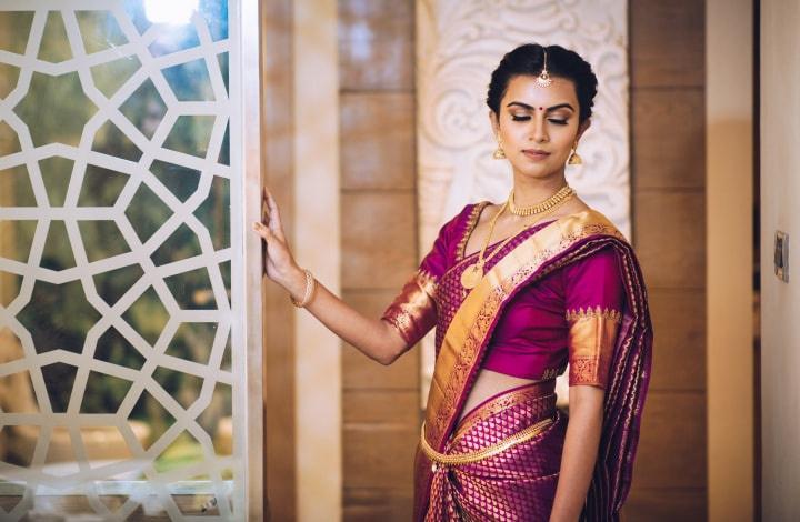 Elegant Tamil Iyer Bride in a Deep Red Madisar Saree