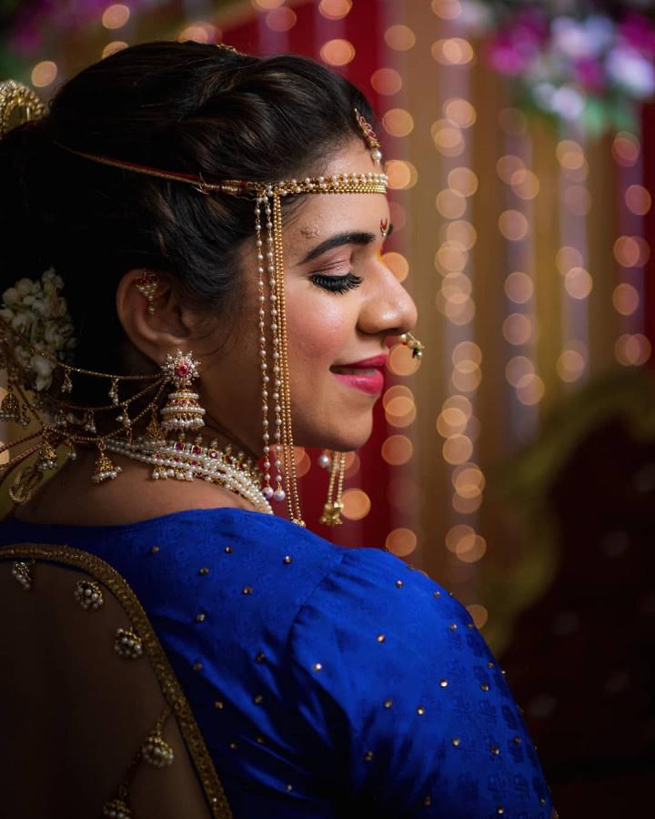 Sigh! Now this is what we call a magical bridal portrait✨ The stunning nauvari  saree, golden pearl jewellery and the dewy makeup finish... | Instagram