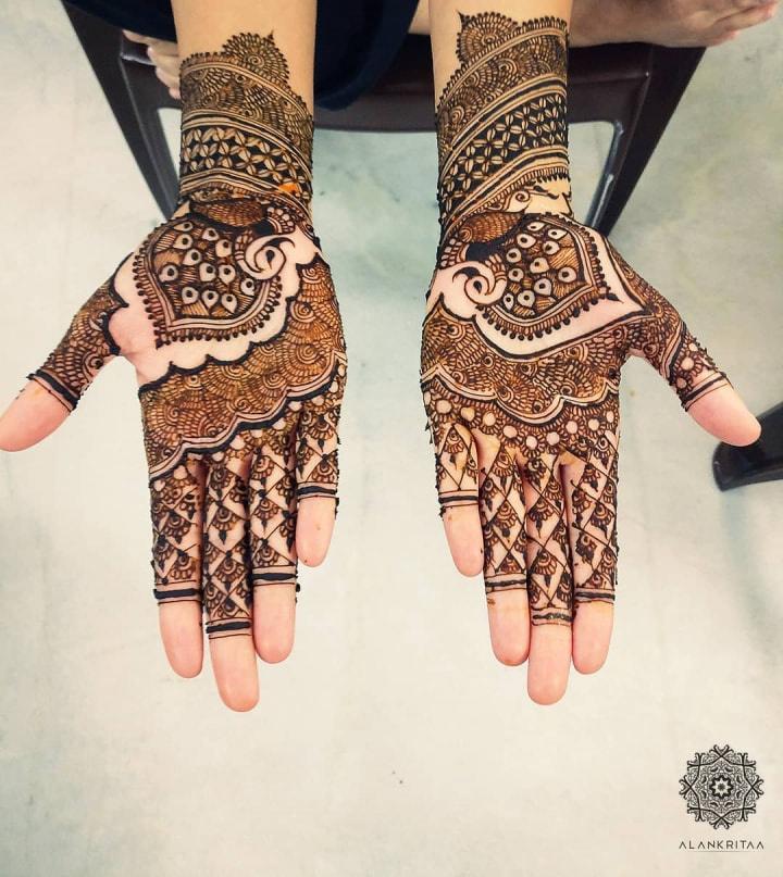 With husbands name in center | Hand henna, Henna hand tattoo, Hand tattoos