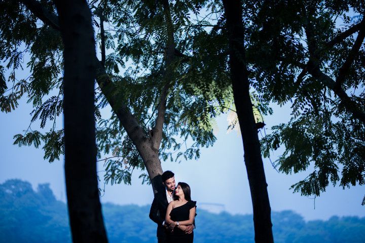 Photo of couple pose for post wedding shoot ideas