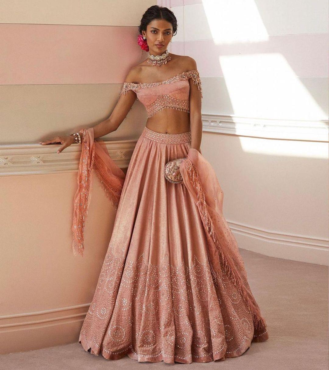 Photo of Bride in Peach and Silver Engagement Lehenga | Engagement dress  for bride, Bridal lehenga shopping, Engagement dresses