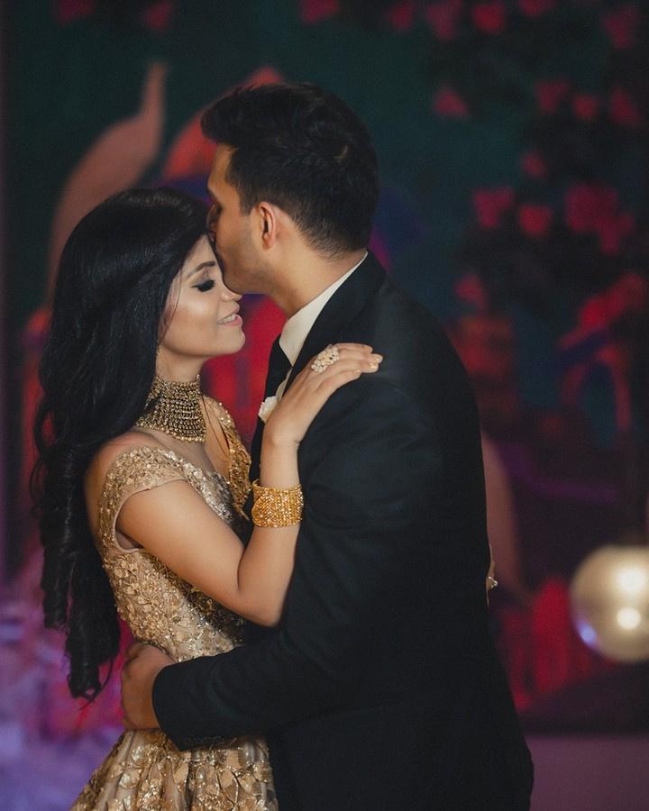 Indian couple posing at reception stage. | Photo 261263