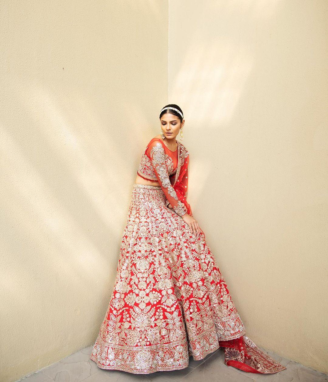 Red Net Embroidered Bridal Wear Lehenga LLCV114788