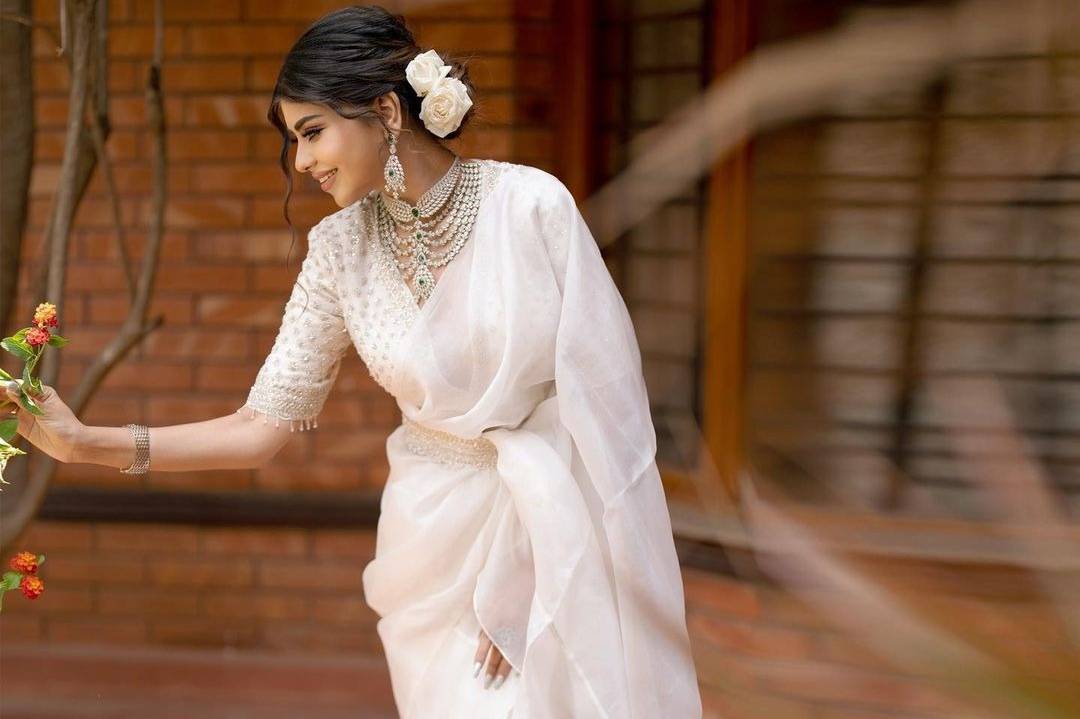 Indian bride in white dress posing for photo shoot  http://www.maharaniweddings.com/gallery/photo/118821 | Wedding dresses  lace, Indian bride, Wedding dresses
