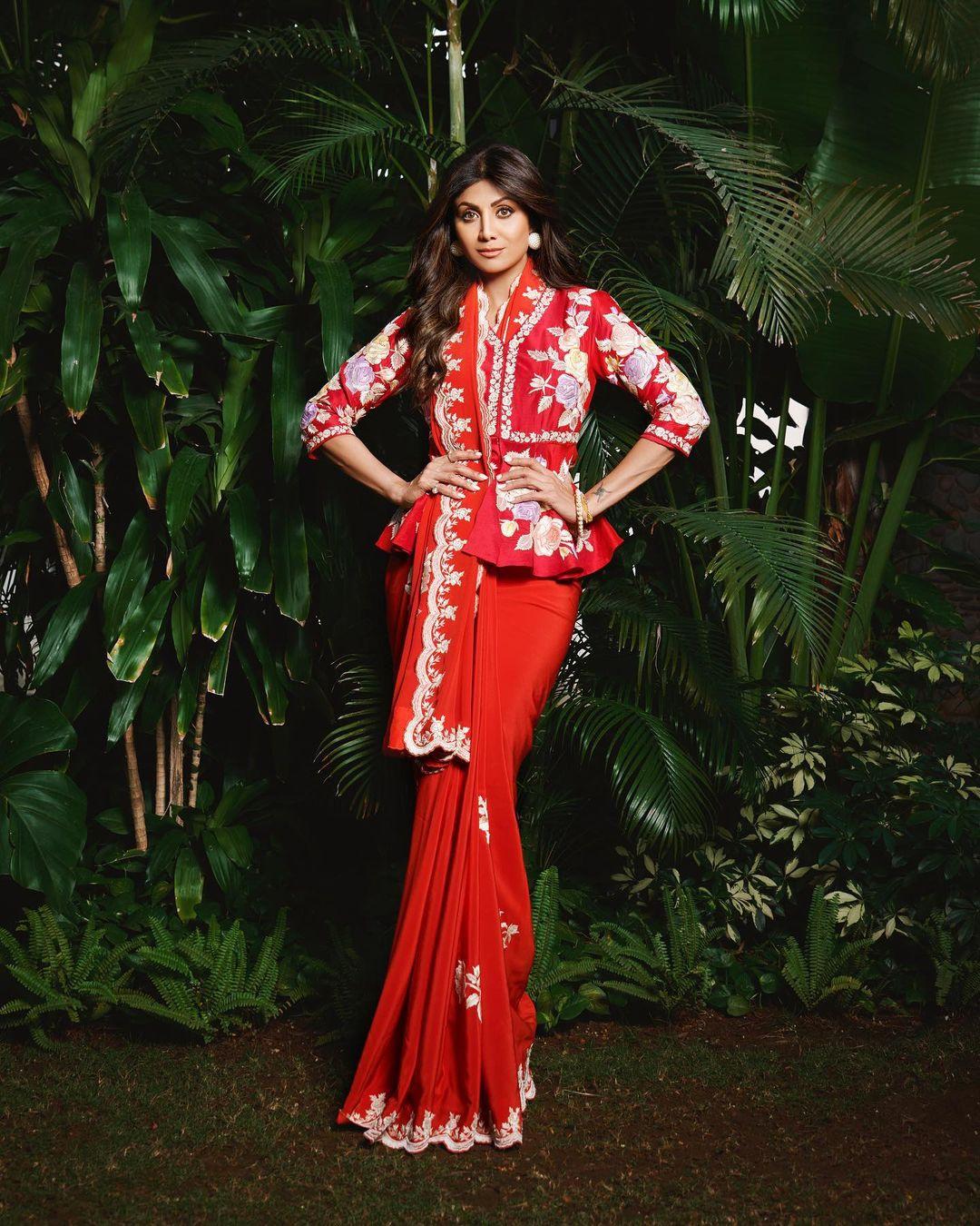 A PORTRAIT OF A GUJARATI Bride dressed in traditional SAREE CALLED 