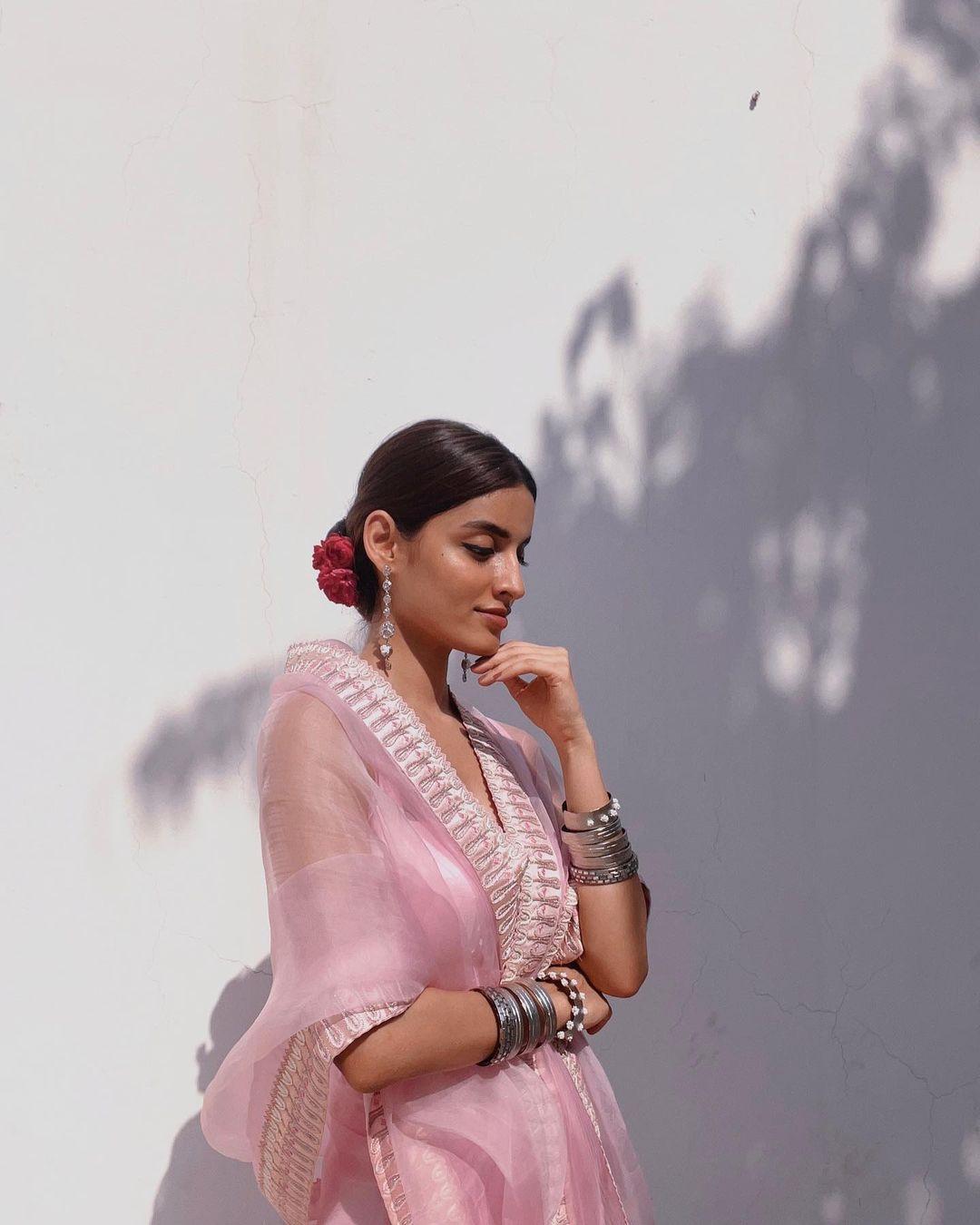 Rakul Preet Singh Poses In Pink Satin Saree, Halter Neck Blouse And  Statement Necklace