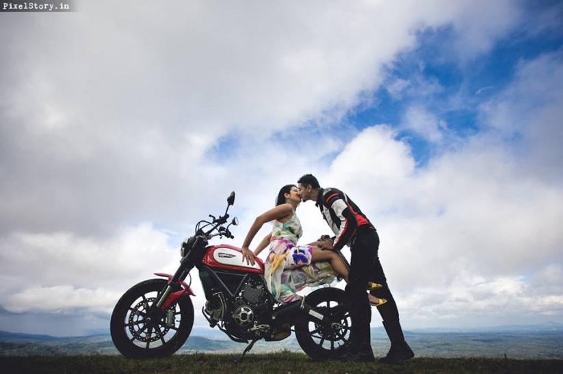 Premium Photo | Full length image of happy lovely young couple posing  together with bicycle and looking at the camera outdoors