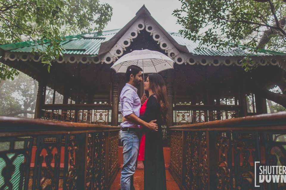 romantic couple in rainy season