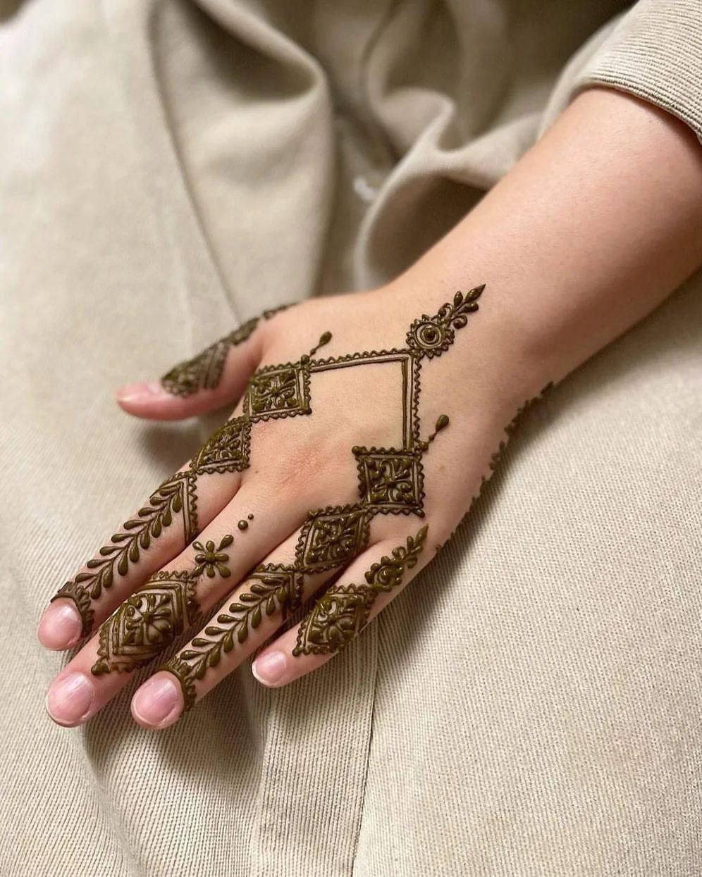 Elaborate Finger Mehndi for Back Hand