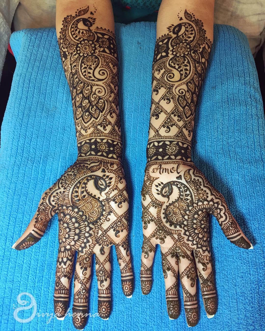 Photo of Half and Half Spaced out Mehendi Design with Names