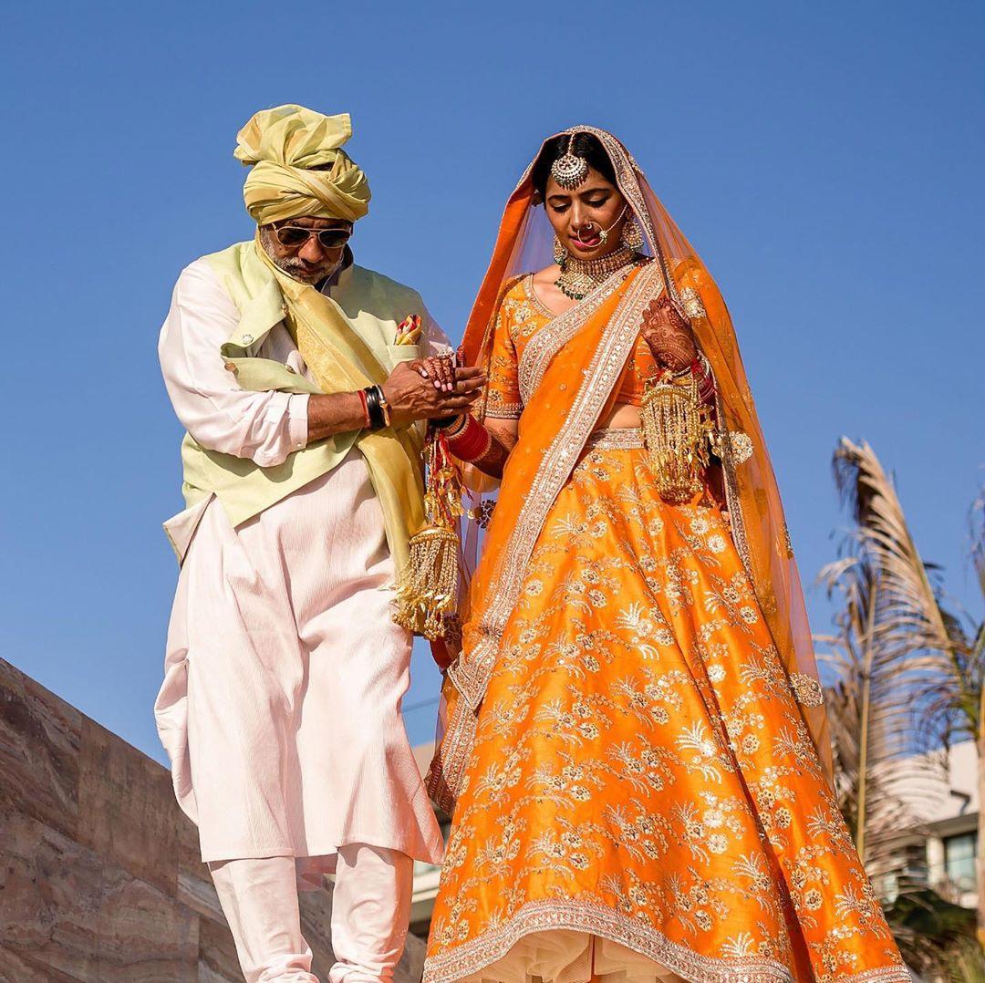 Fresh Orange Bridal Lehengas for 2022 Weddings That Are Winning Hearts! |  WeddingBazaar