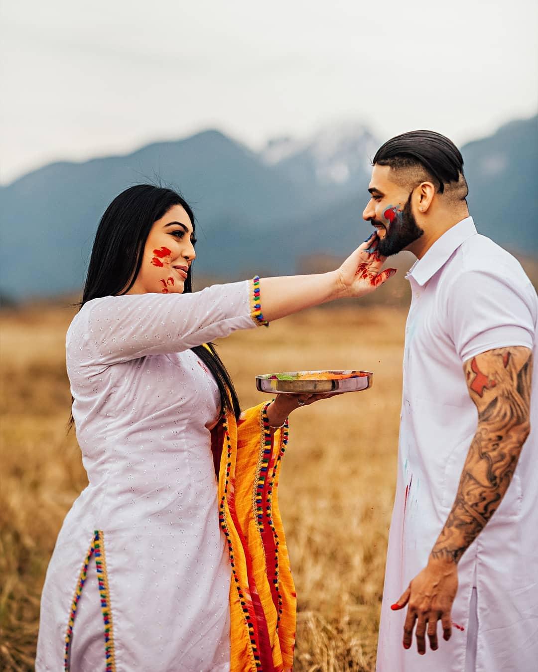 147 Couple Playing Holi Stock Photos, High-Res Pictures, and Images - Getty  Images