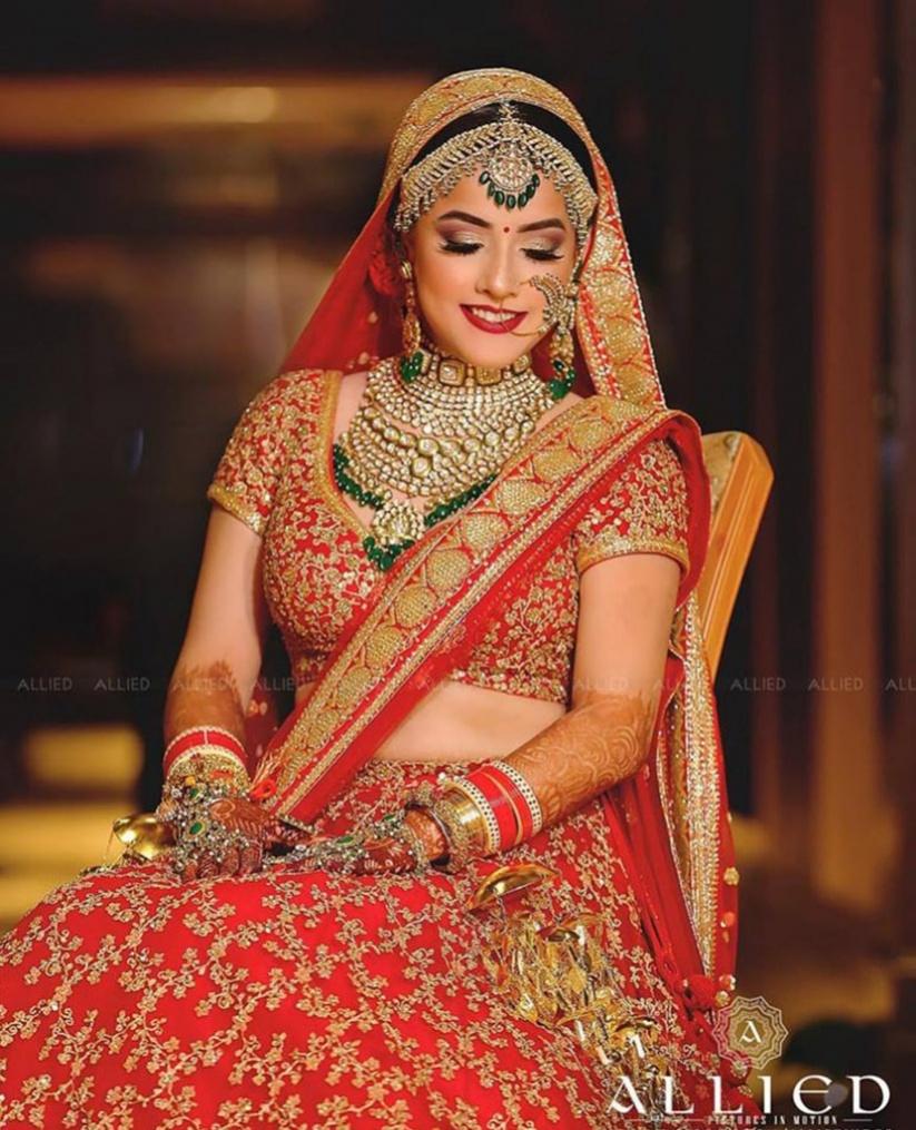 13751 blood red bridal lehenga images allied all red lehenga with golden embroidery all over