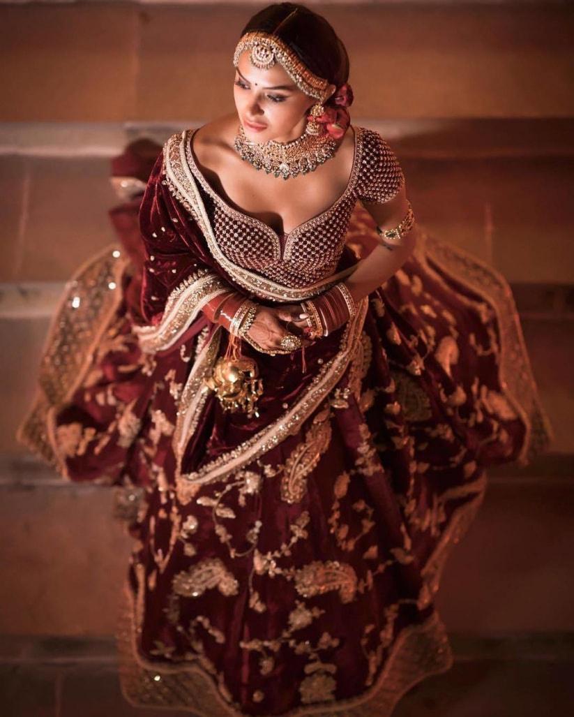 Indian Bridal Wear - Sabyasachi Inspired Maroon Velvet Zardozi Lehenga – B  Anu Designs