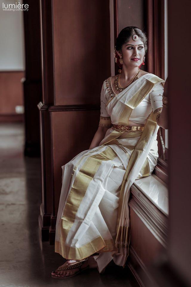 Photo of white and gold saaree | South indian bride, Malayali bride, Wedding  dresses for girls