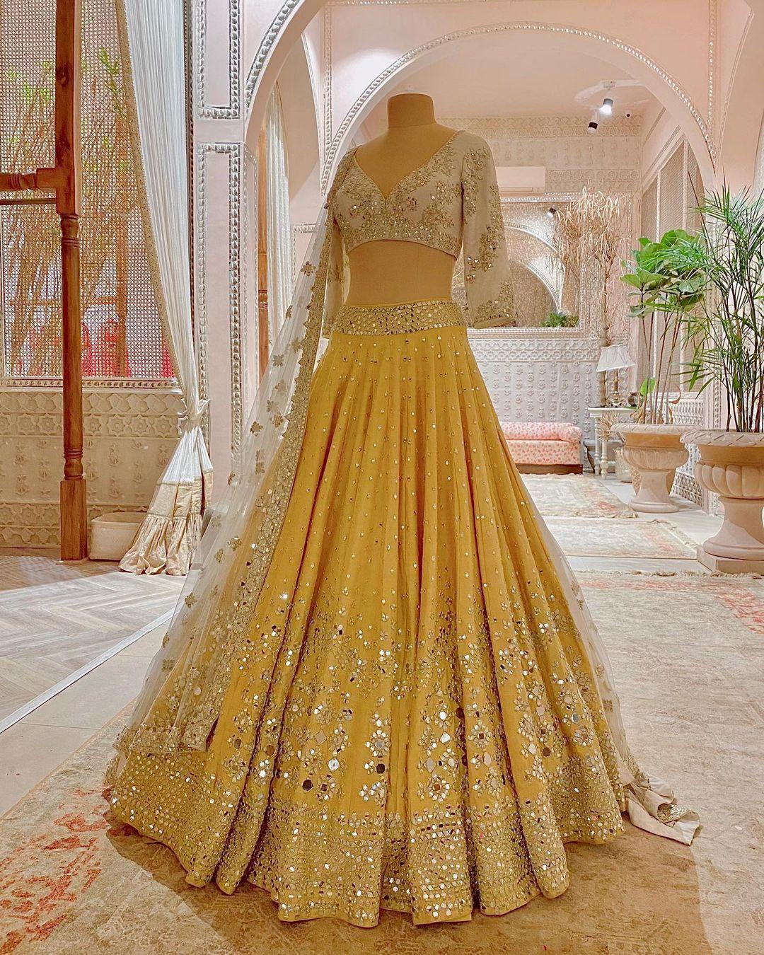 Which color of lehenga is suitable to dusky skin girls? - Quora