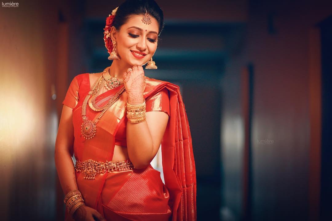 What is the significance of wearing a red saree/lehnga at weddings in India  (Kerala)? - Quora