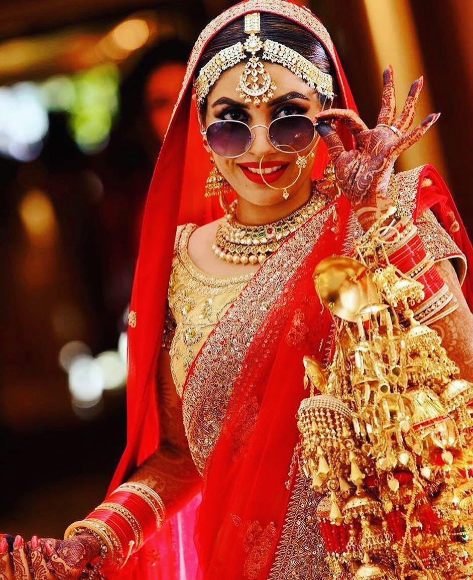 Designer Lehenga | Indian wedding poses, Indian bride poses, Bride groom  photoshoot