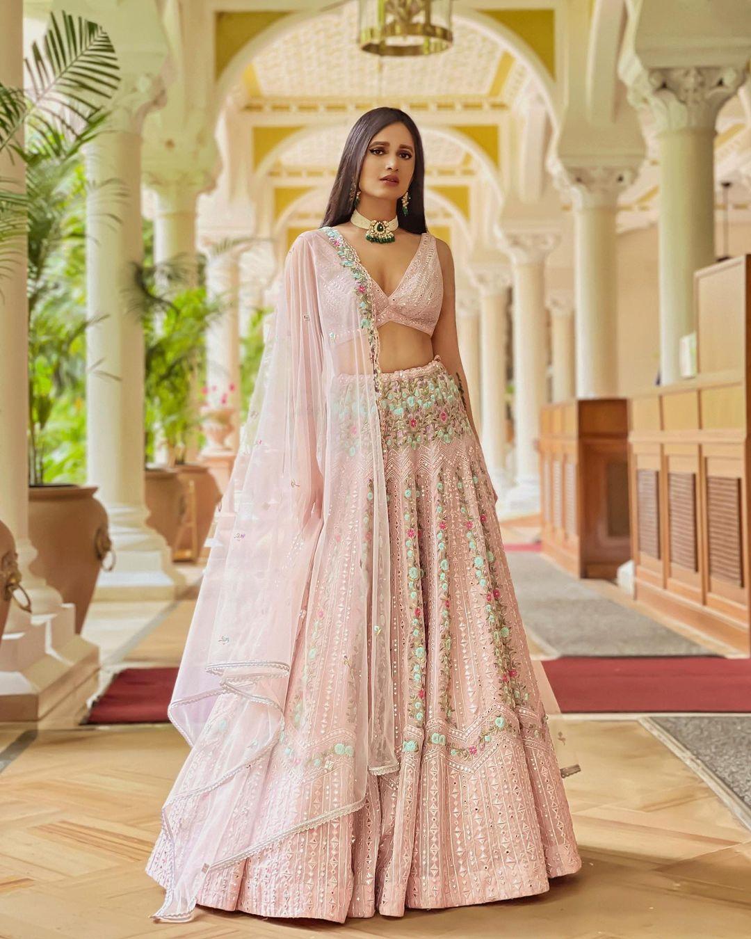 Featuring pink and purple bridal lehenga set with heavy intricate golden  thread embroidery on top, back… | Indian wedding dress, Indian dresses, Pink  bridal lehenga