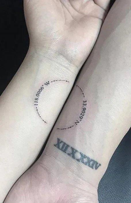 Couple matching tattoo of the word 