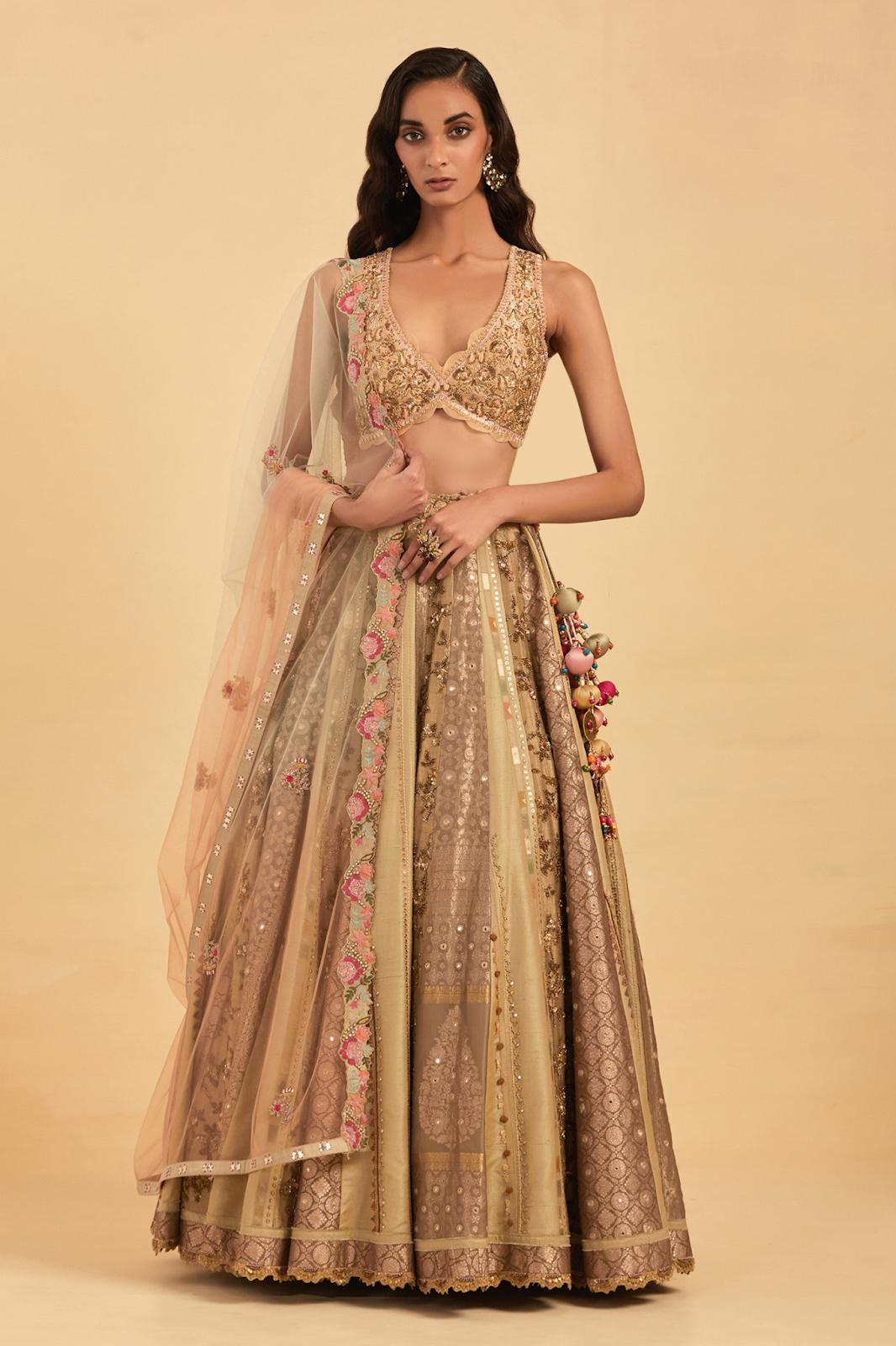 Golden Bridal Lehenga has become very popular with Indian Brides for their  wedding, reception a… | Indian bridal outfits, Golden bridal lehenga,  Indian bridal dress