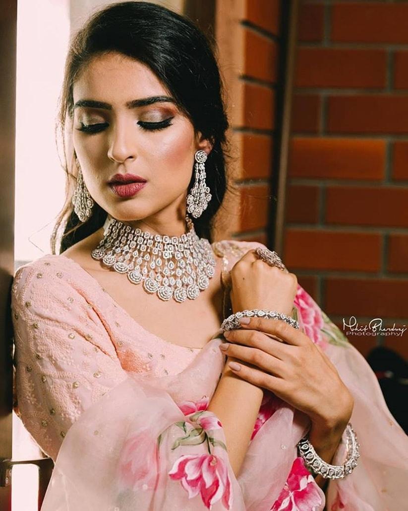 Behold the enchanting beauty in her pink lehenga, adorned with flawless pink  makeup. She truly embodies the essence of a mesmerizing Barb... | Instagram