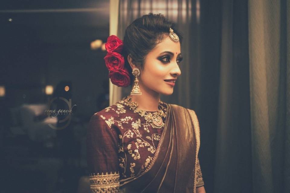 Messy bun for my beautiful bride Nandini 🌹 #bridalhairstyle #bridalhairdo  #bride #messybun #hairdowithroses #rose | Instagram