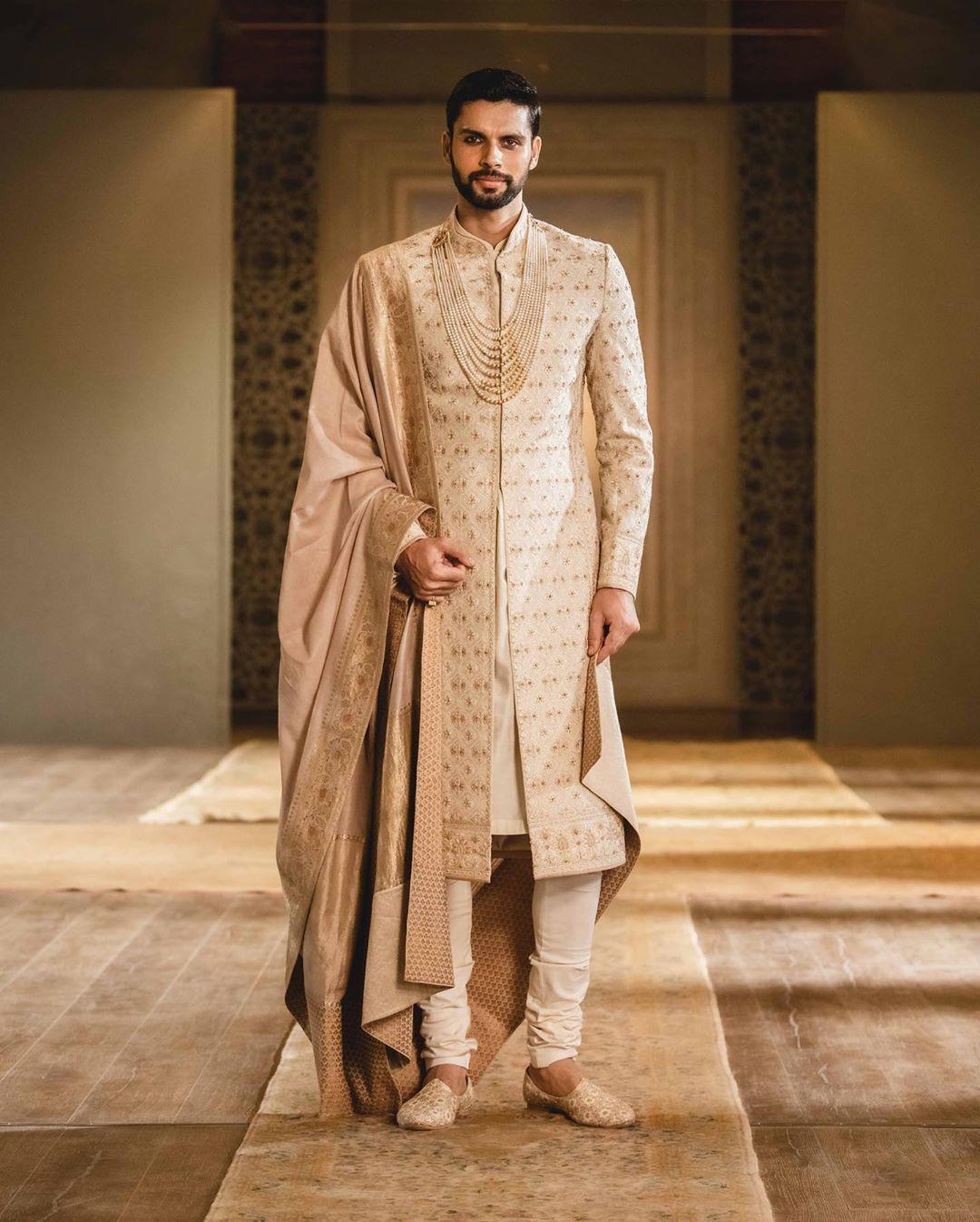 Matching sherwani shop with red lehenga