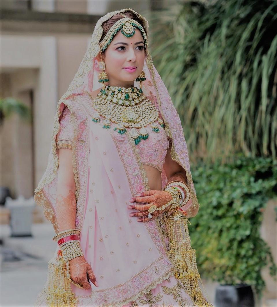 Manish Malhotra Bride Exudes Charm In A Gold Adorned Baby Pink Lehenga  Paired With Unique Jewellery | Indian bridal outfits, Indian bridal dress,  Celebrity bride