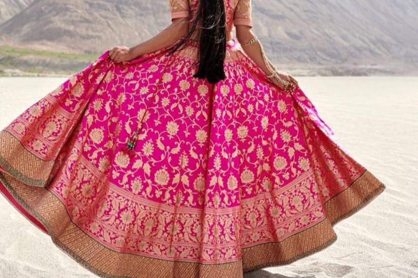 GRACEFUL PLEATED BANARASI LEHENGA CHOLI IN PINK ORGANZA - HALFSAREE STUDIO  - 4213968