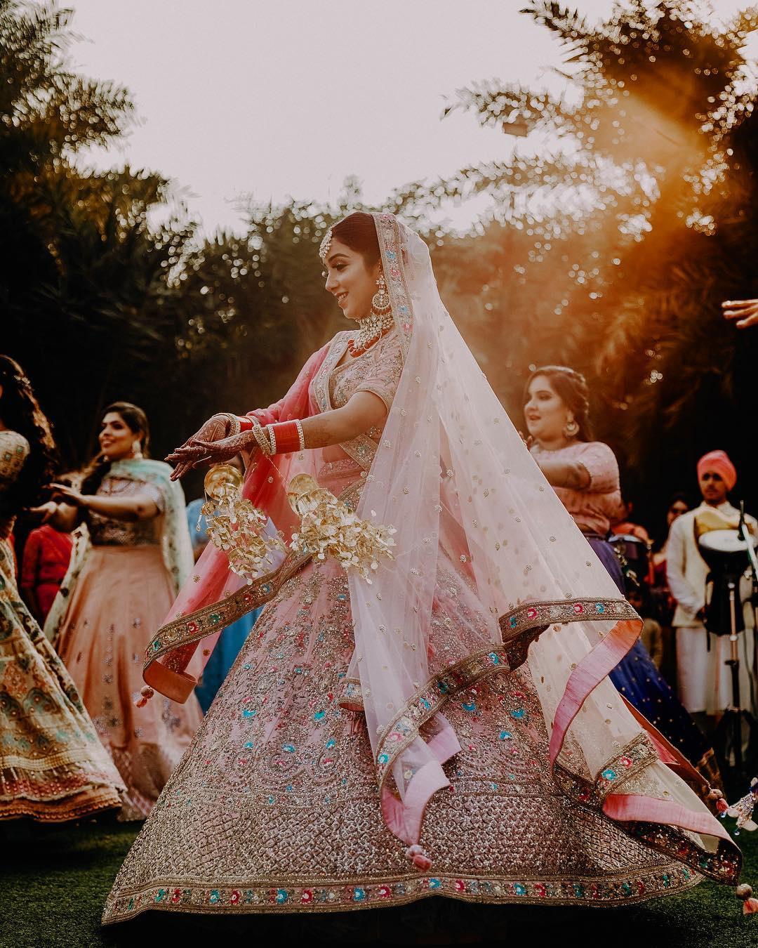 Indian wedding bride reception hot pink lengha