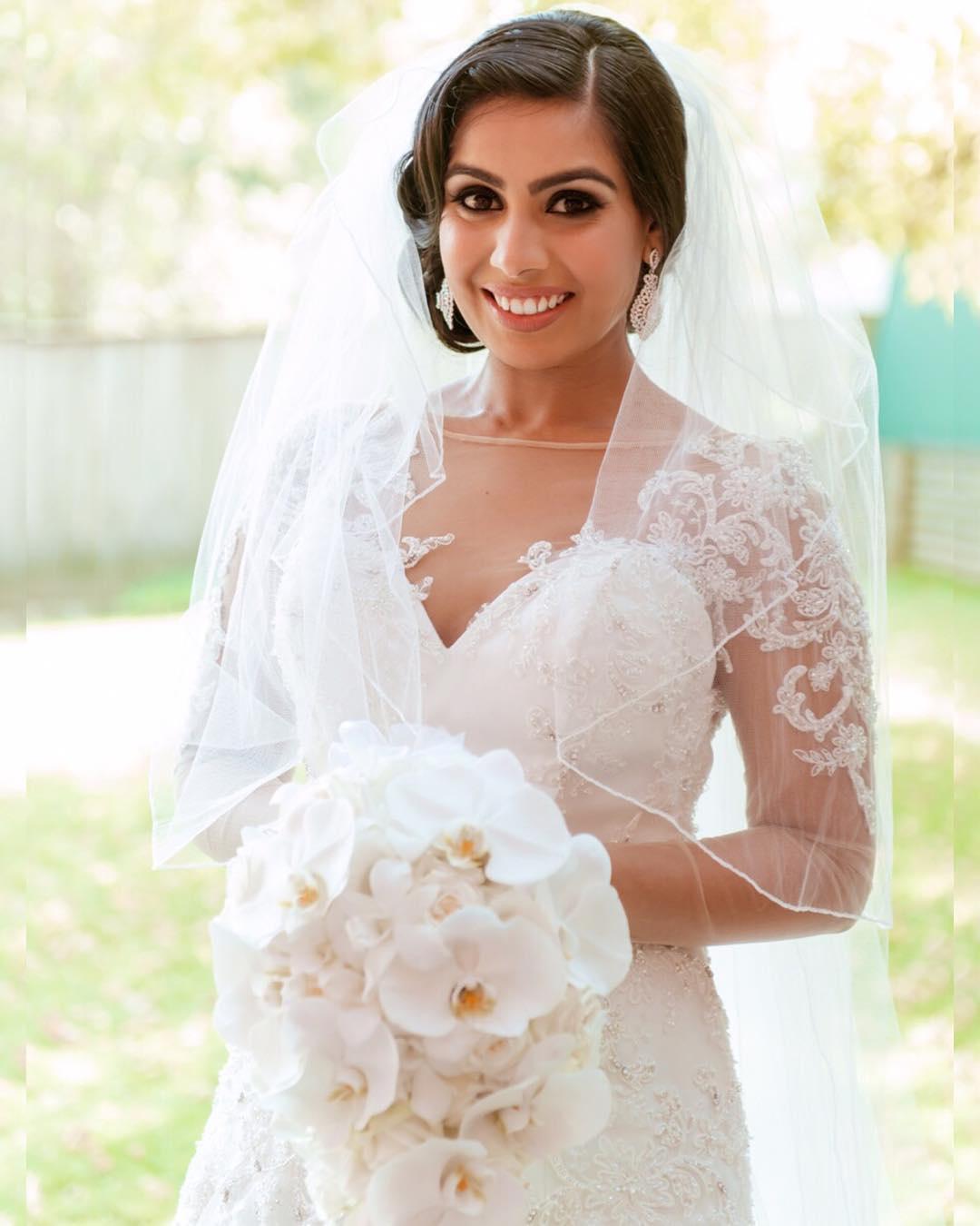 Signature Christian bridal A-line gown in net carried by bride Elizabe –  Kavani Bridal Wear