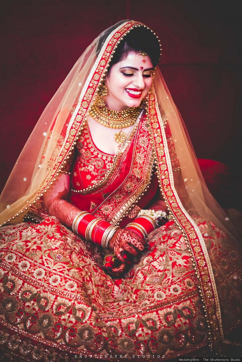 red bridal lehenga with contrast dupatta