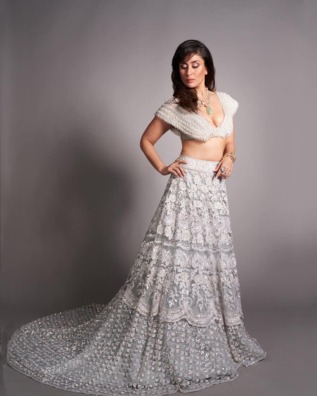 Buy Powder White Lehenga Choli With Elaborate Balloon Sleeves And Multi  Colored Hand Embroidered Buttis Online - Kalki Fashion