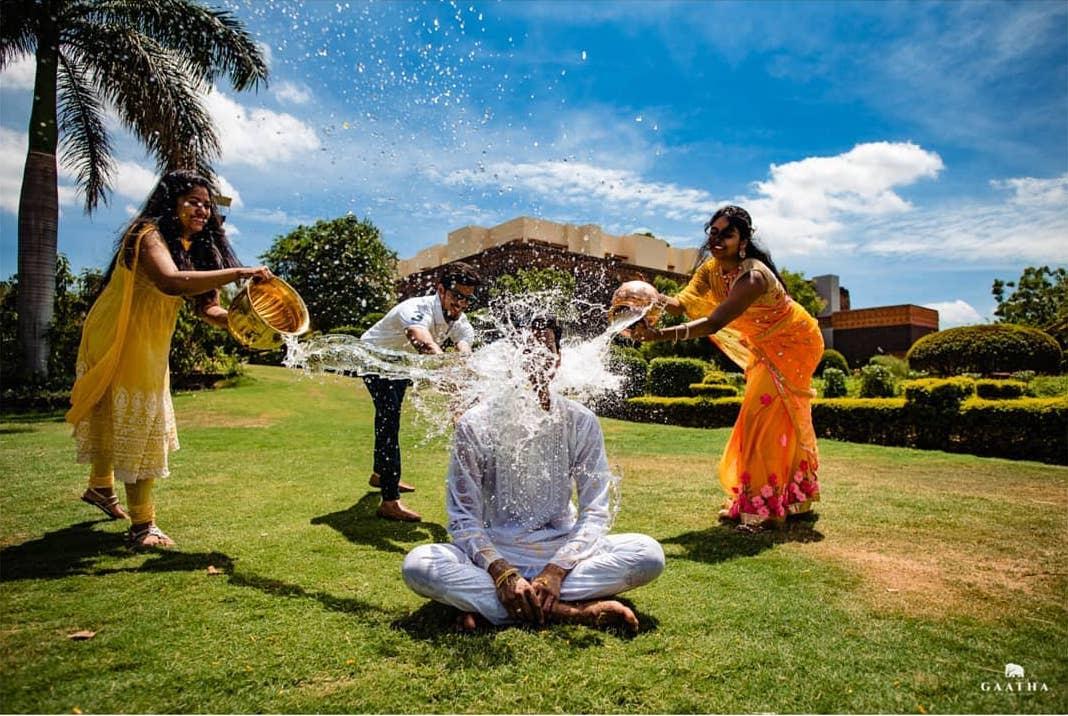 Premium AI Image | A couple smiles at a holi festival