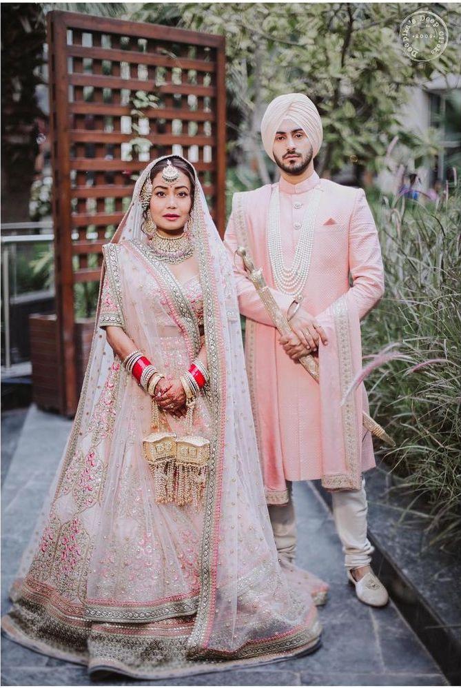 Indian couple posing at reception venue. | Photo 270718 | Couple wedding  dress, Indian wedding outfits, Engagement dress for groom