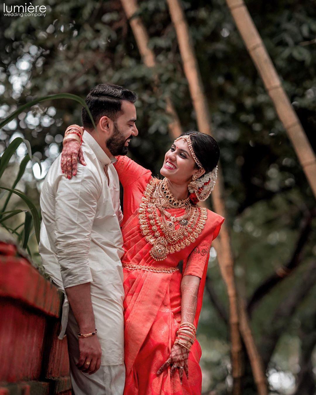 Nikki Galrani in a bright red embroidered saree! | Fashionworldhub