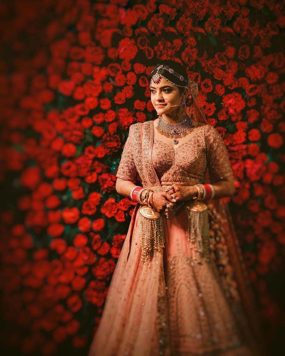 Pristine Elegance: The Beauty of Designer Peach Colour Lehenga.