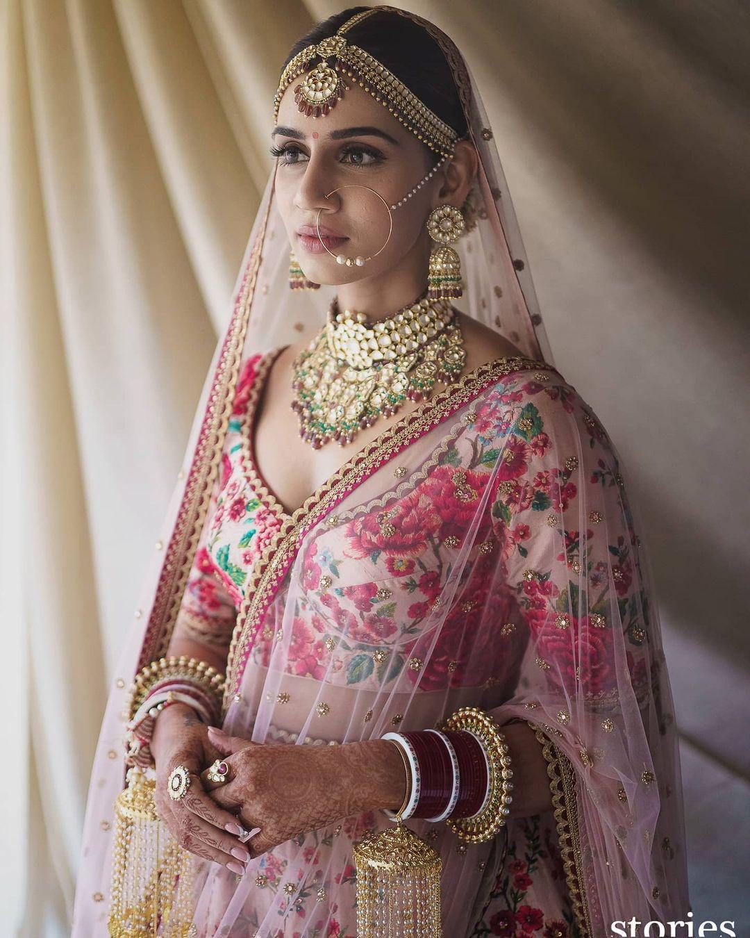 Bride with beautiful nose ring  Bridal jewellery indian, Indian bridal  photos, Bridal makeup