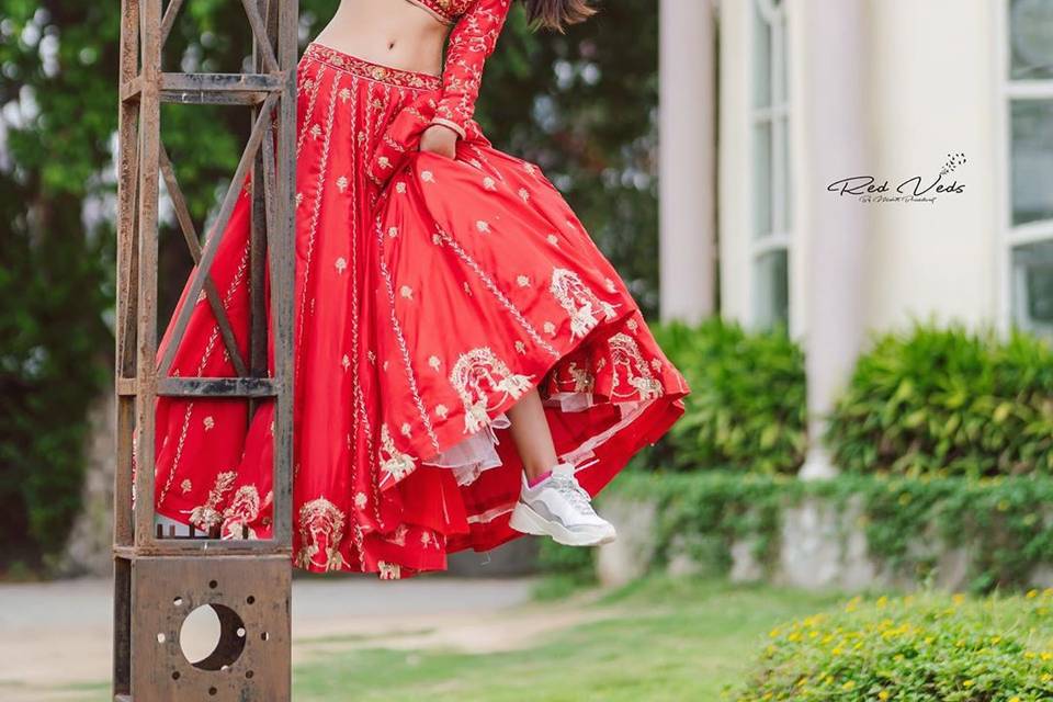 Woman in Red Lehenga Dress Performing a Traditional Dance · Free Stock Photo