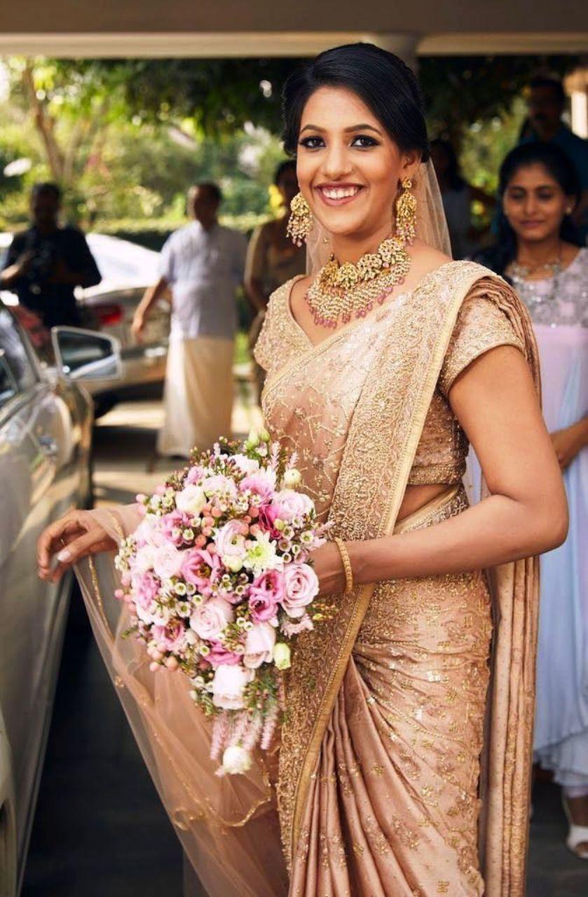 Bride in golden clearance saree