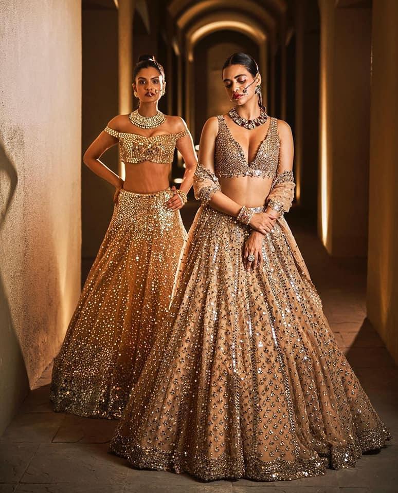 Janhvi Kapoor, Isha Ambani show you how to wear mirror work lehengas |  Vogue India