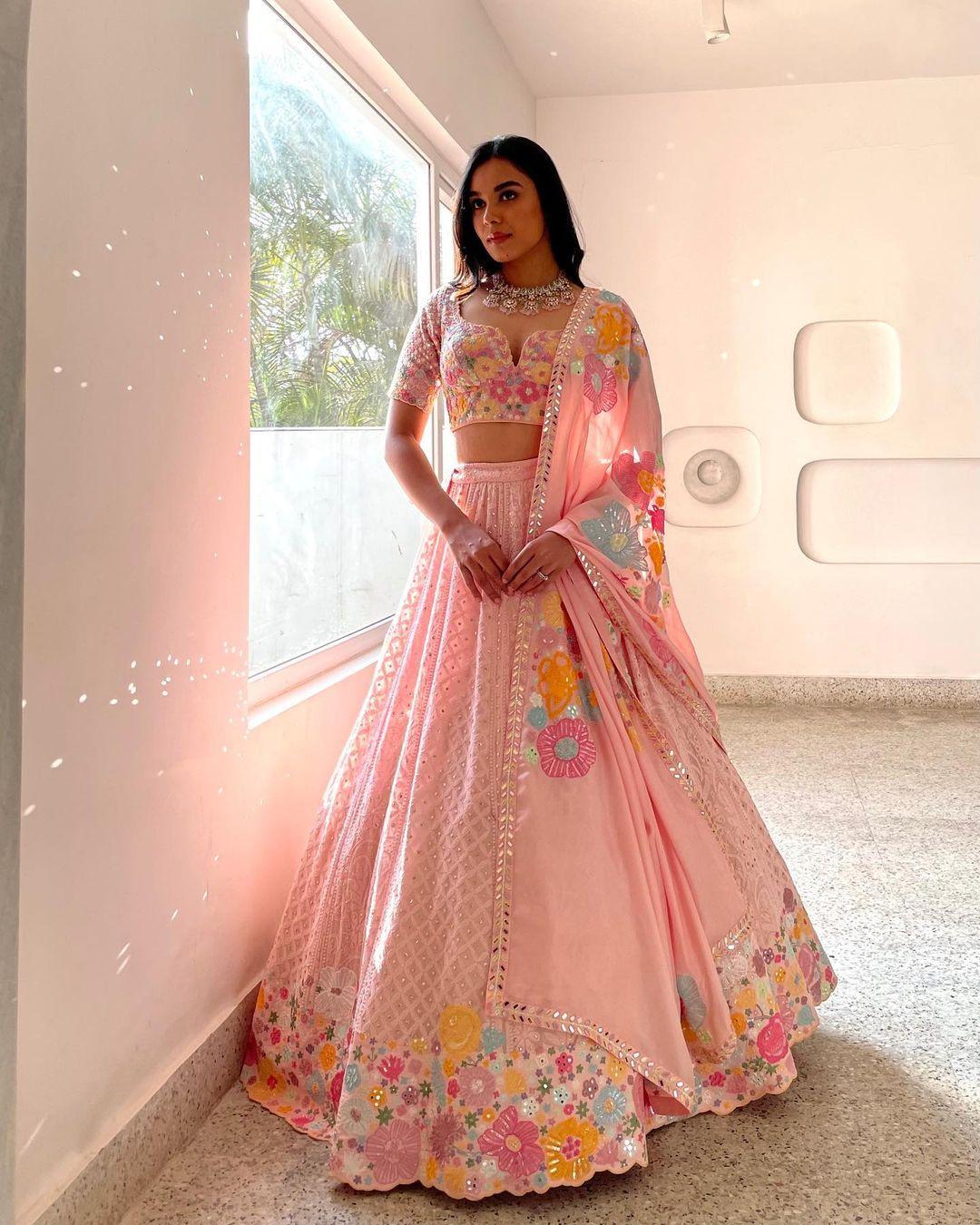 Buy Coral Pink Sequins Net Wedding Lehenga Choli at Ethnic Plus