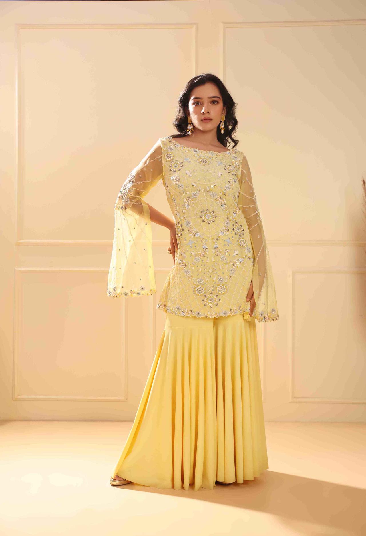 Mrunal Thakur enjoys friend's Haldi ceremony in yellow Indo-western wear! |  Party wear indian dresses, Elegant royal dresses, Stylish dress book