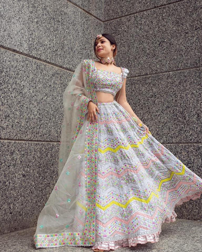 Buy Peach Mirror Work Net Lehenga Choli online At Zeel Clothing