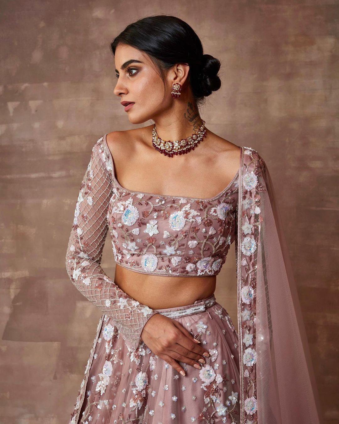 Ivory & Mauve Lehenga Set With Dupatta #sleeveless #lehenga #blouse  Editor's Note Featuring a mauve &… | Blouse designs indian, Trendy blouse  designs, Unique blouse