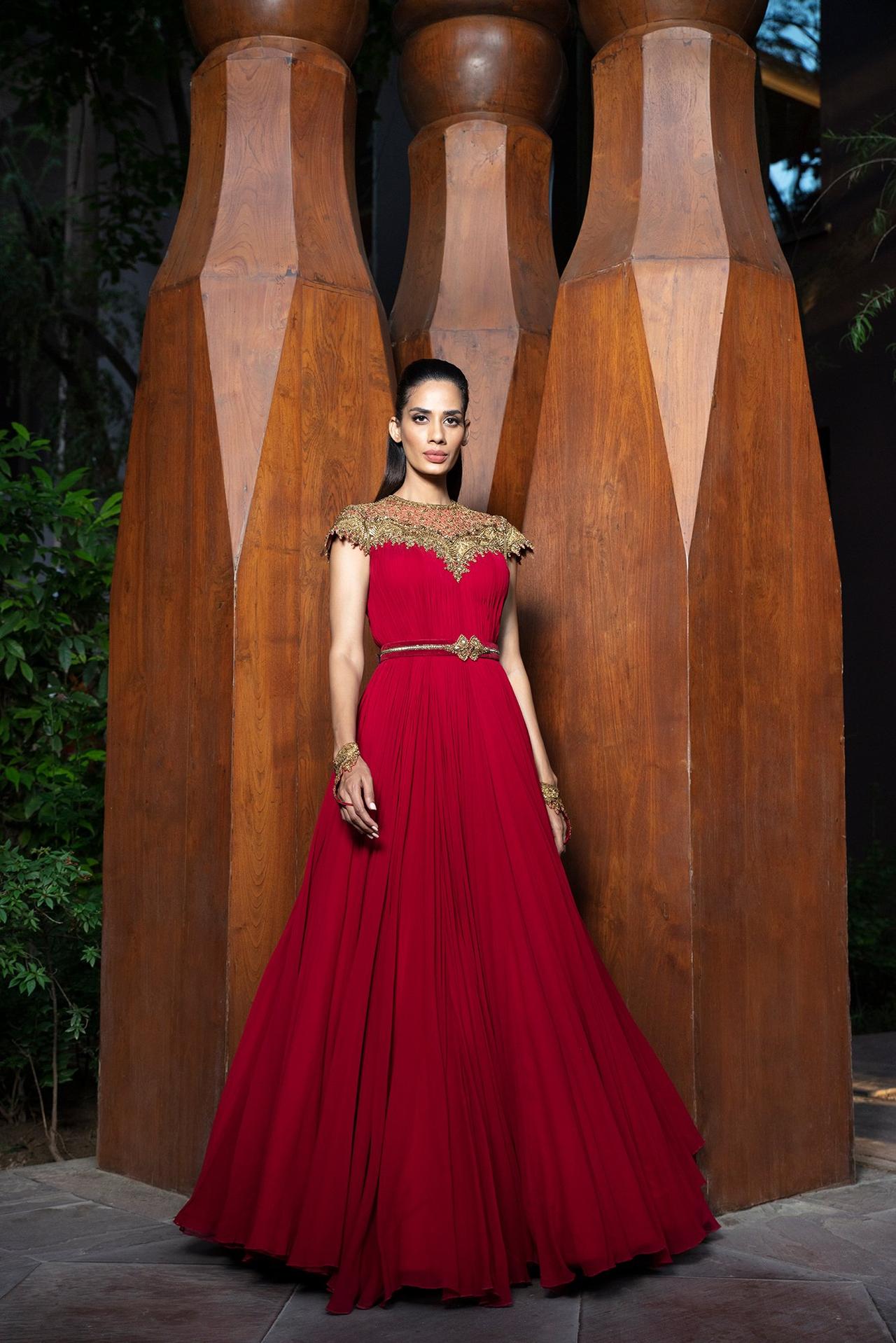 Pernia's Pop-Up Shop - Jewel Tones : Shantanu & Nikhil lead vintage  inspiration into the modern age with the corseted bodice, opulent volume  and lustrous sheen of these signature gowns. Jewellery :